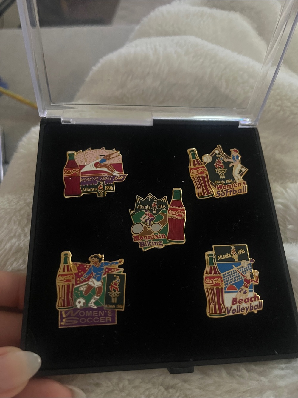 Coca cola collectable pins of sports